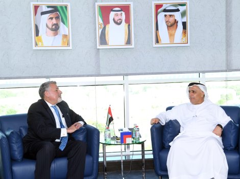 an image of Al Tayer and the American Consul