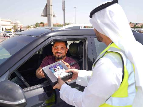 an image of RTA team cautioning drivers