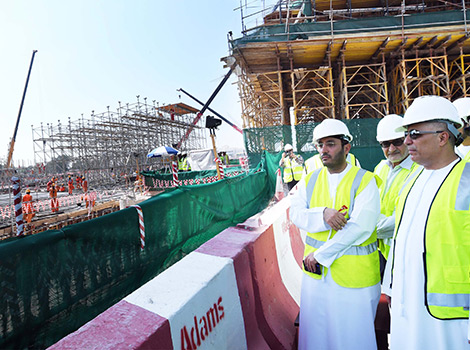 an image of Al Tayer inspecting works in the Project