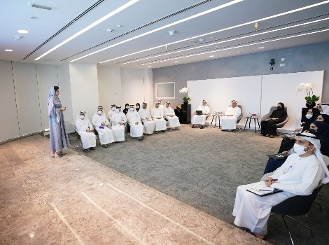 an image of Al Tayer in a gathering with the staff of the Public Transport Agency